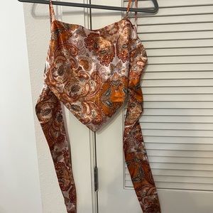 Satin, bandana, tie-in-the-back crop top with warm orange, burgundy & blue tones
